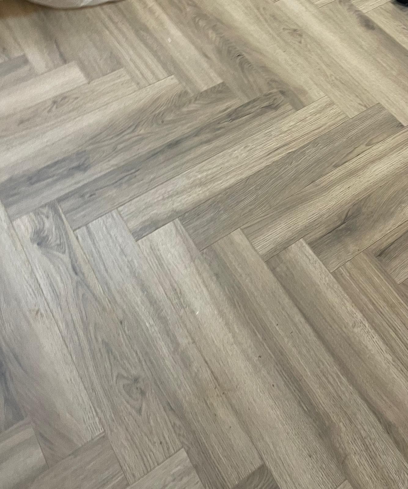 Lime Oak Herringbone Laminate Flooring 12mm – Pale Grey Parquet Style
